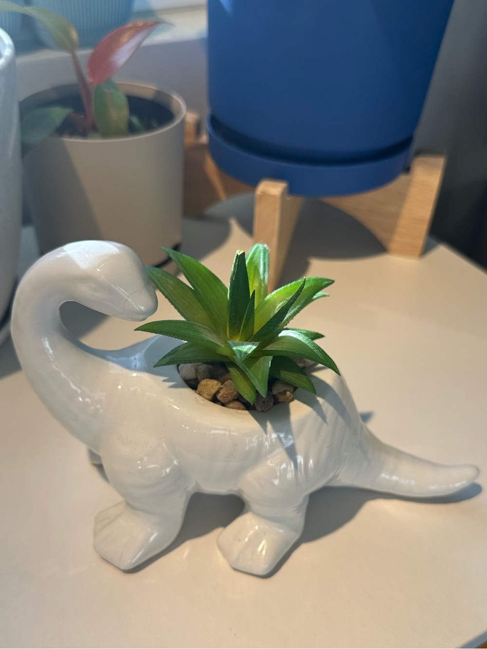 White Ceramic Dinosaur Planter with Green Succulent